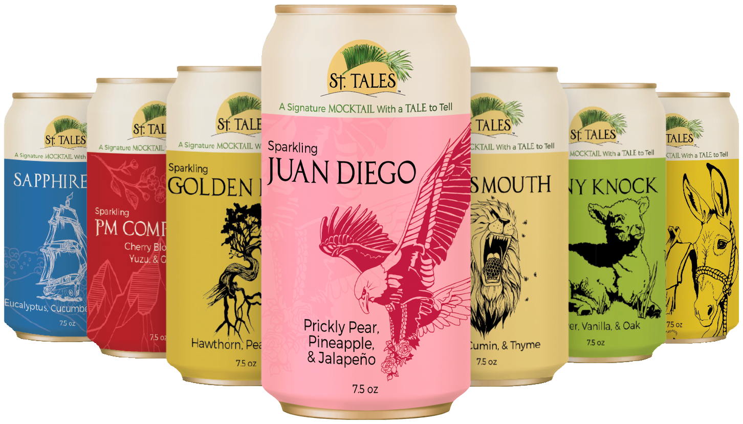 Seven St. Tales mocktail cans form a lineup, with the pink Juan Diego can centered in front.